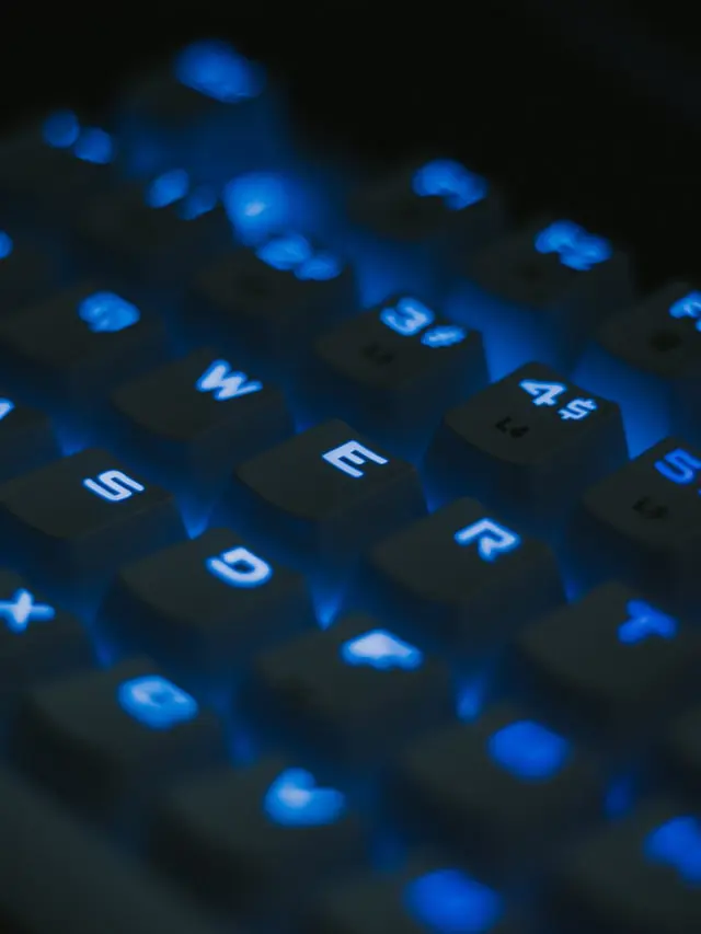 blue and black computer keyboard photo – Photo by Gio Bartlett on Unsplash